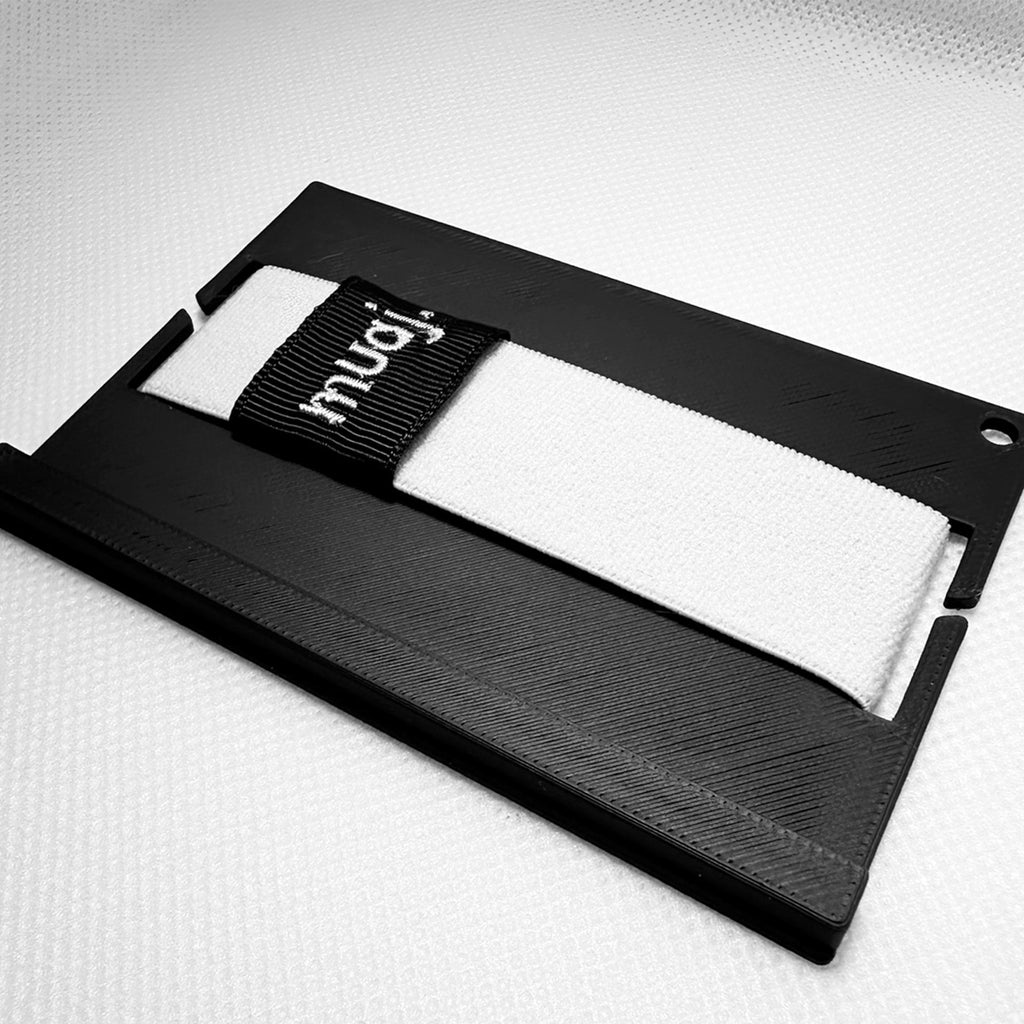 Black cardholder with a white elastic band featuring the brand 'muaj.' on a white background